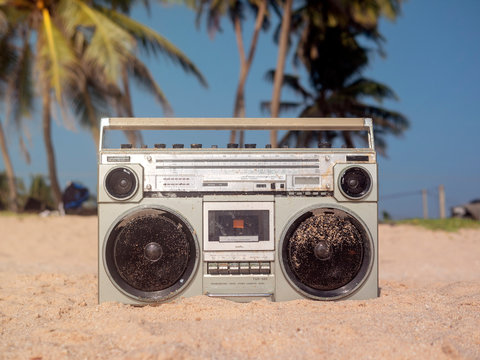 Tape recorder in sea foam and waves.
