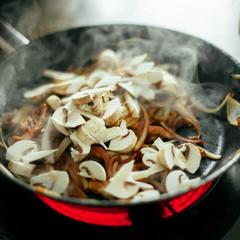 mushrooms in a frying pan Champignon