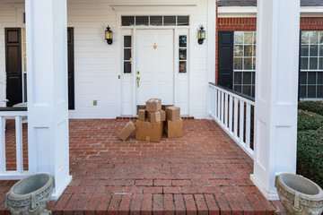 Packages on front porch of home