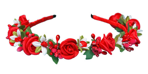 A wreath of red roses. Folk hat made of flowers. Hair ornament red and white