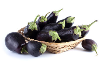 Eggplants on plate isolated on white