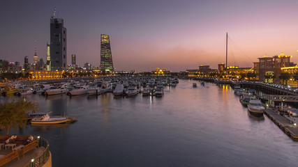 Yachts and boats at the Sharq Marina day to night timelapse hyperlapse in Kuwait. Kuwait City, Middle East