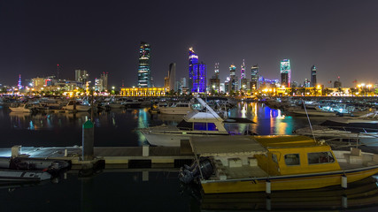 Yachts and boats at the Sharq Marina night timelapse hyperlapse in Kuwait. Kuwait City, Middle East