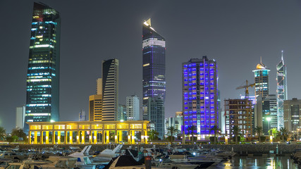 Fototapeta na wymiar Yachts and boats at the Sharq Marina night timelapse hyperlapse in Kuwait. Kuwait City, Middle East