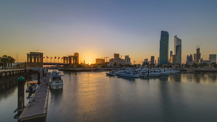 Fototapeta na wymiar Sunrise. Yachts and boats at the Sharq Marina timelapse in Kuwait. Kuwait City, Middle East