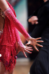 Elegant arms of latin ballroom dancer in a movement