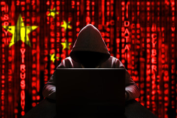 Cyber threat from china. Chinese hacker at the computer, on a background of binary code, the colors...