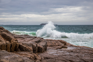 waves crashing on the rocks