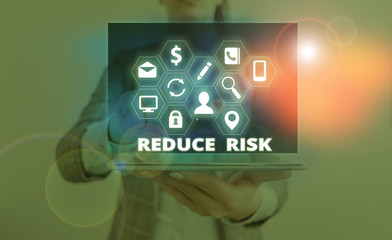 Word writing text Reduce Risk. Business photo showcasing lessen the potential damage that could be...
