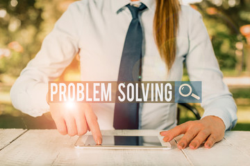Writing note showing Problem Solving. Business concept for to find an answer or means of...