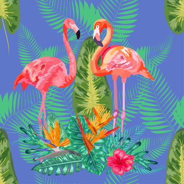Pink flamingos, tropical flowers and jungle leaves, hibiscus, pink lotus. Beautiful seamless floral jungle pattern background