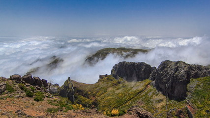 View down over the clouds from slopes of Pico do Arieiro, Madeira timelapse
