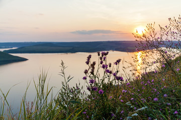 Fototapeta na wymiar A beautiful sunset over a lake