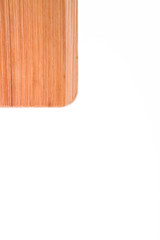 Top view on corner of a wooden cutting board