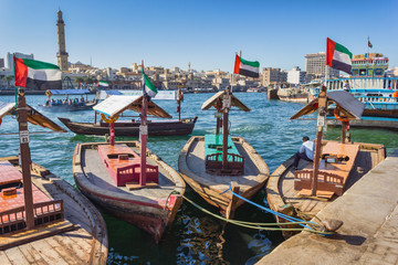 Fototapeta na wymiar Boats on the Bay Creek in Dubai, UAE