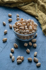 Roasted And Salted Pistachios In Glass Bowl