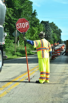 Flagman Stopping Traffic
