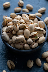 Roasted And Salted Pistachios In Ceramic Bowl