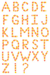 Alphabet made from sliced citrus fruits. Oranges, grapefruits. Isolated on a white background