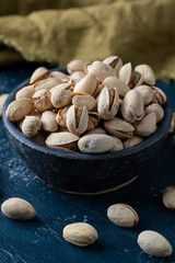 Roasted And Salted Pistachios In Ceramic Bowl