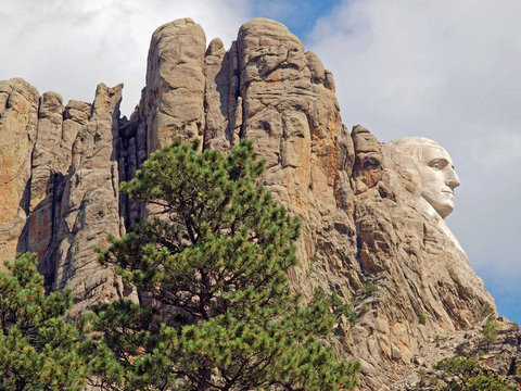 View from the Needles Highway of the sculpted profile of President George Washington in the Mount Rushmore National Monument, Keystone, South Dakota, U.S.A.