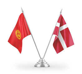 Denmark and Kyrgyzstan table flags isolated on white 3D rendering