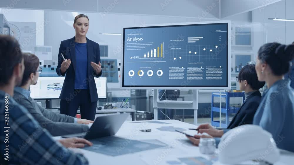 Aufkleber modern industrial factory meeting: confident female engineer uses interactive whiteboard, makes repo