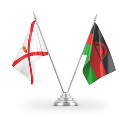 Malawi and Jersey table flags isolated on white 3D rendering