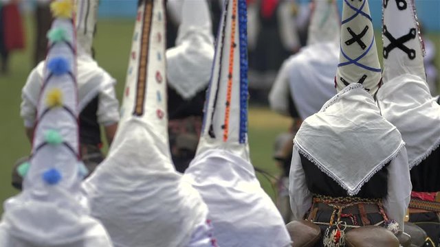 Participants take part in the International Festival of Masquerade Games Surva. The festival promotes variations of ancient Bulgarian and foreign customs and masks. x5 slow motion.