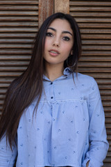Portrait of confidence caucasian woman with ideal slim sexy body, wearing longsleave shirt and...