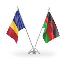 Malawi and Romania table flags isolated on white 3D rendering