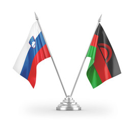 Malawi and Slovenia table flags isolated on white 3D rendering