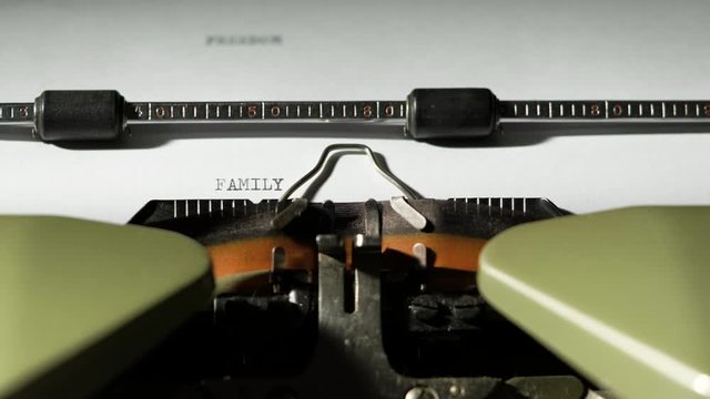 FAMILY written on old green vitage retro typewriter