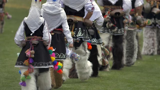Participants take part in the International Festival of Masquerade Games Surva. The festival promotes variations of ancient Bulgarian and foreign customs and masks. x5 slow motion.