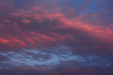 Fototapeta na wymiar Dark twilight dramatic colorful clouds