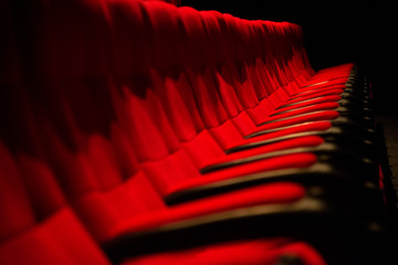 Fototapeta premium Red color Cinema seats with no people.