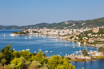Naklejka na ściany i meble Skiathos island Greece port harbor city overview town landscape Mediterranean Sea travel