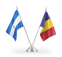 Romania and Nicaragua table flags isolated on white 3D rendering