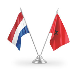 Morocco and Netherlands table flags isolated on white 3D rendering