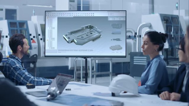 Modern Factory Office Meeting Room: Diverse Team of Engineers, Managers and Investors Talking at Conference Table, Watching Interactive TV that shows 3D Mechanism Made with CAD Software