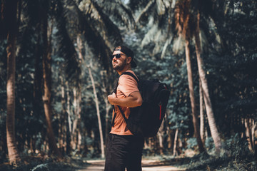 handsome portrait man using smartphone, happy face, sunglasses, beard, beach, sea, travel, internet, Outdoor portrait, hipster style, holding phone in hand, answer texts message. beard man, instagram