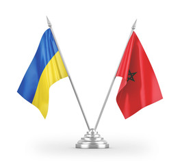 Morocco and Ukraine table flags isolated on white 3D rendering