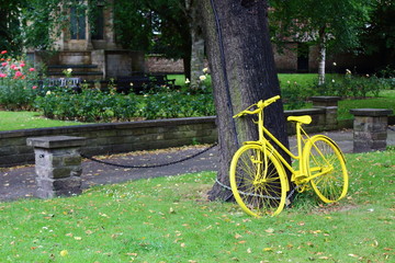 yellow bicycle in park