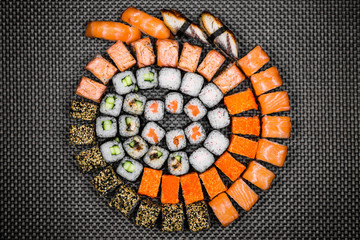 Japanese rolls on a dark textured background