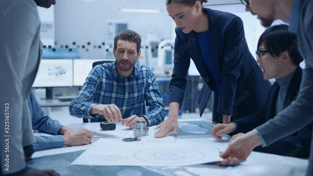 Poster busy diverse team of engineers and specialists gather around conference table, they discuss project 