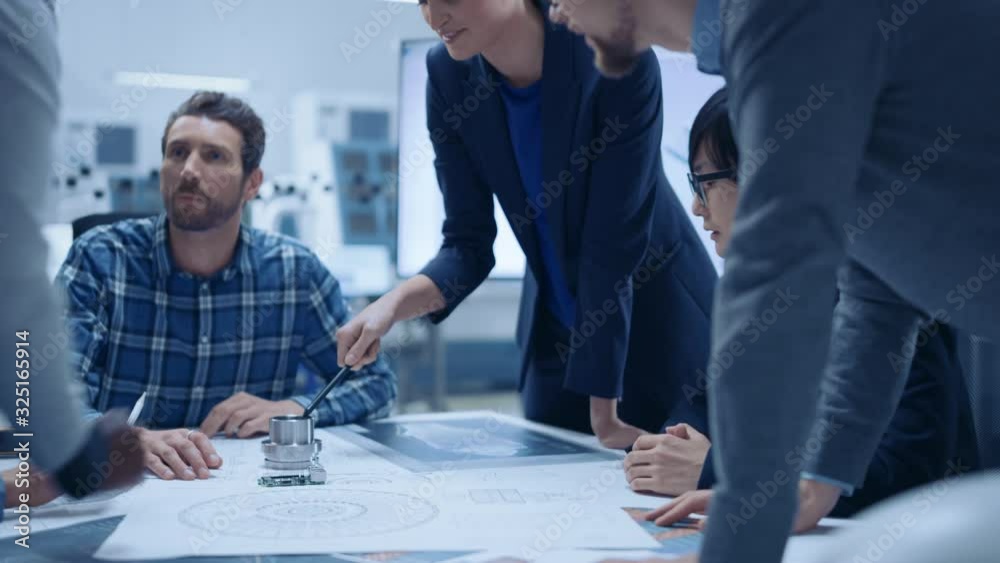 Poster busy diverse team of engineers and specialists gather around conference table, they discuss project 
