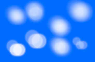 Blue background with white lights making sparkles
