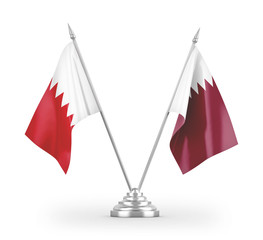 Qatar and Bahrain table flags isolated on white 3D rendering