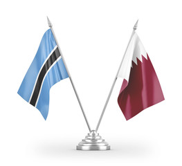 Qatar and Botswana table flags isolated on white 3D rendering