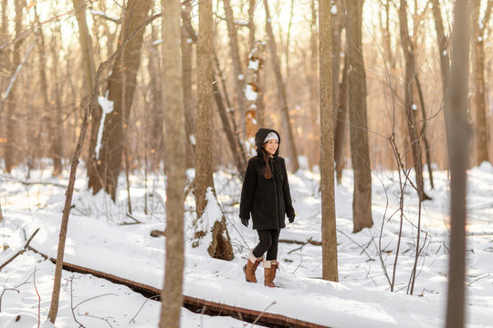 Winter People Lifestyle Young Happy Woman Walking On A Forest Walk Alone Enjoying Cold Weather Day On A Active Stroll In Teddy Jacket And Shearling Boots.